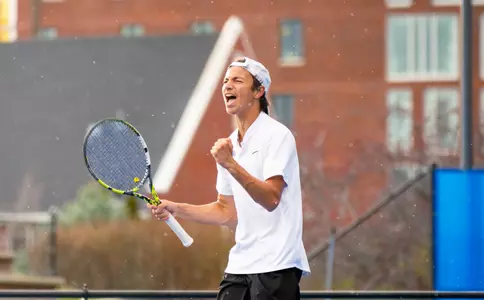 Idriss Haddouch celebrates a win during the Utah State match on March 28, 2025.