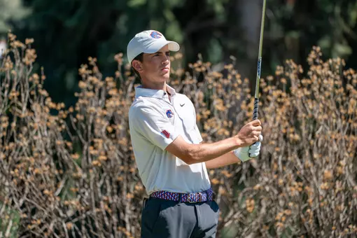 Cole Reuck watches the ball after a shot