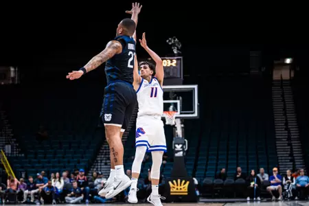 Alvaro Cardenas attempts a jump shot against Butler