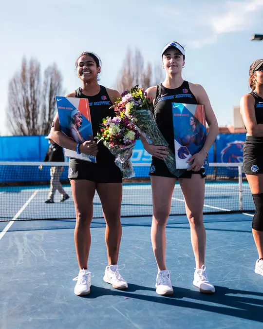 Bhakti Shah and Ari Briones Ginesta posing together during the senior day celebration.