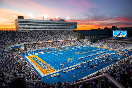 Albertsons Stadium at night, Boise State football team entering field before playing Portland State