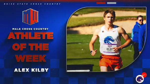 Alex Kilby, wearing a white jersey, runs in the MW Conference Meet in 2024