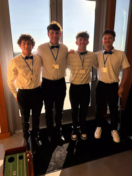 Men's golfers at 2025 Serving Up Wishes event