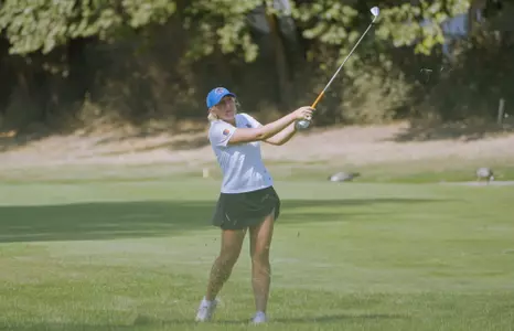 Macee Greenwood in her back stroke while playing a qualifying round