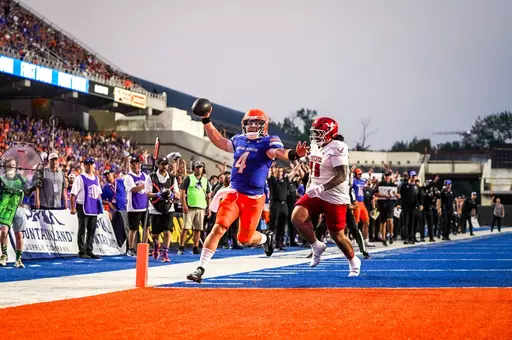 Maddux Madsen rushes for a touchdown in the victory over Eastern Washington.