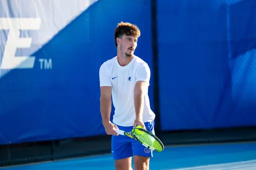 Carson Baker preparing for the serve