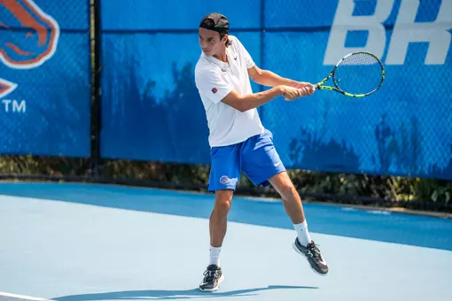 Idriss Haddouch preparing to hit the tennis ball.