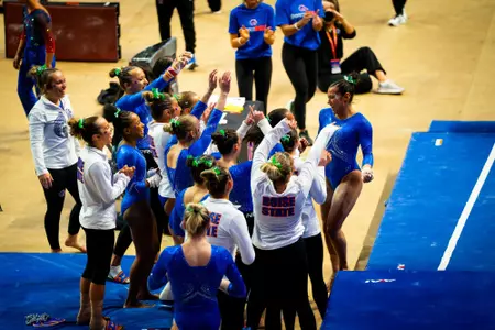Bella Delarosa celebrates with team after vault