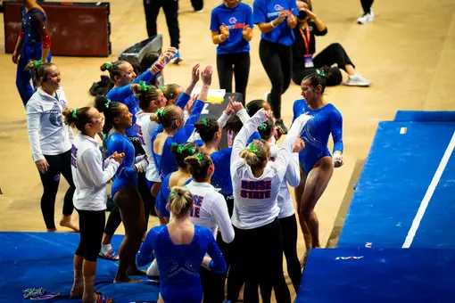 Bella Delarosa celebrates with team after vault
