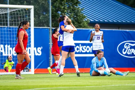 Boise State soccer celebrating after a goal.