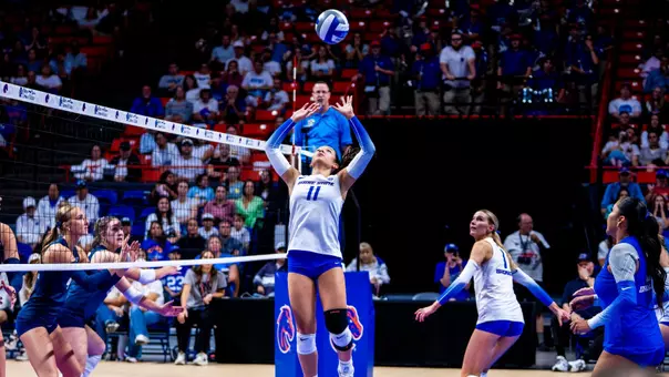Jenelle Legates setting the ball against BYU