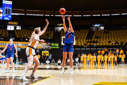 Libby Hutton taking a shot