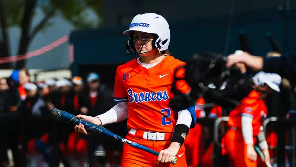 Marissa Gonzalez walks from the dugout to home plate.