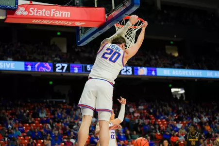 Drew Fielder dunls the basketball against San Jose State
