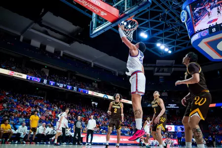 Javan Buchanan scores on a layup against Wyoming on Feb. 24 at ExtraMile Arena