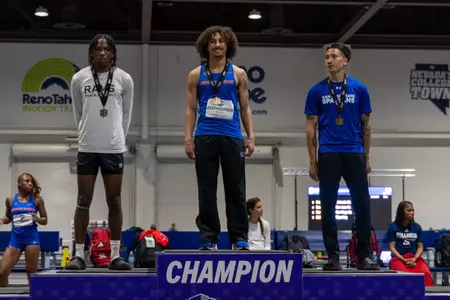 Raekwon Weatherspoon with his gold medal on the podium