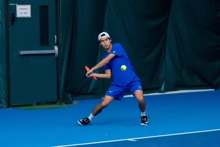 Taiyo Kurata rallying the ball back.