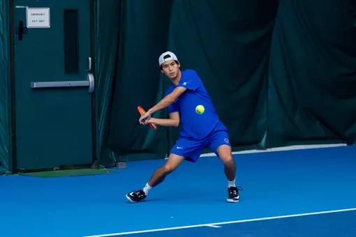 Taiyo Kurata rallying the ball back.