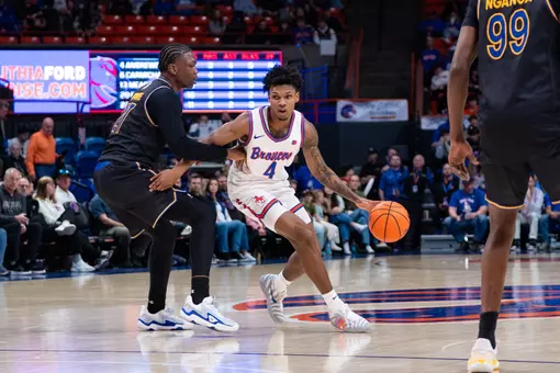 Dylan Andrews dribbles the basketball against San Jose State at ExtraMile Arena