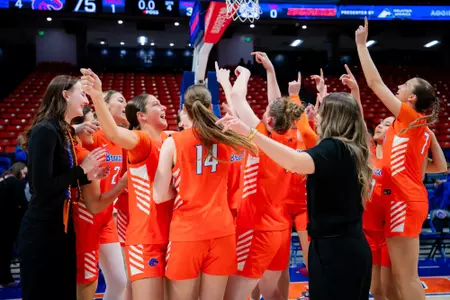 Boise State women's basketball celebrating and dancing.
