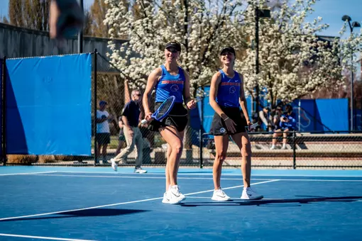 Zdena Safarova and Tereza Polakova laughing after clinching a match