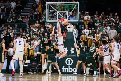 Drew Fielder dunks the basketball against Colorado State at Moby Arena in the regular season finale