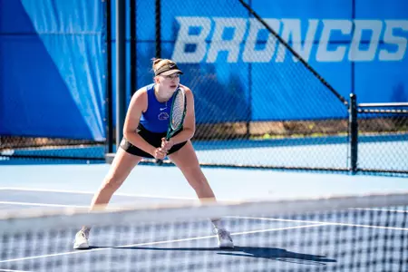 Stella Beldiman preparing to receive a serve