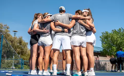 Women's tennis team huddle