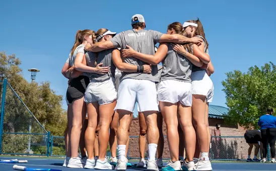 Women's tennis team huddle