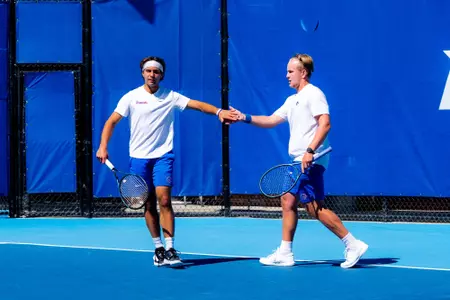 Stewart Aronson and Filip Soderqvist high fiving