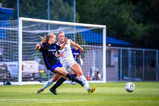 Madie Donovan kicking the ball.