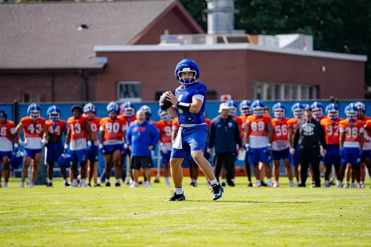 Maddux Madsen prepares to throw a pass.