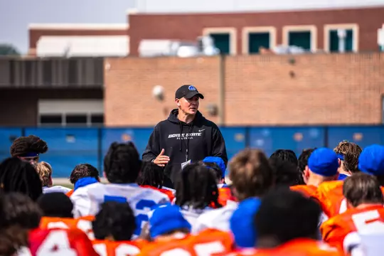 Spencer Danielson addresses the team at practice.