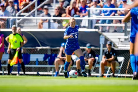 Madie Donovan dribbling the ball.