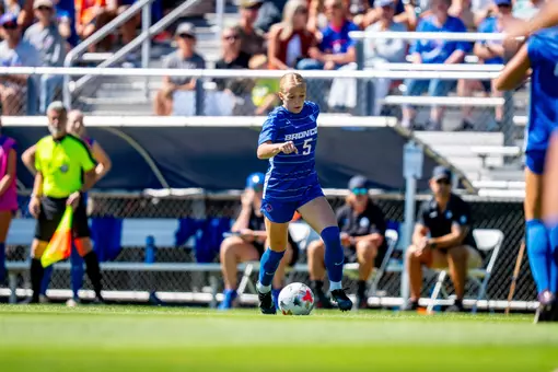 Madie Donovan dribbling the ball.
