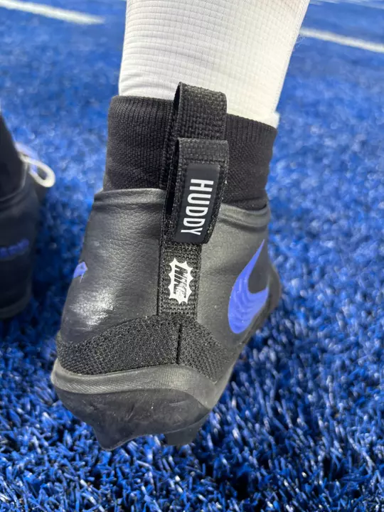 Roman Caywood's cleats with Hudson's name