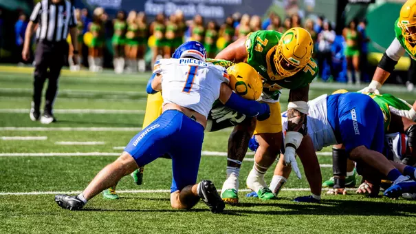 Boen Phelps makes a tackle at Oregon
