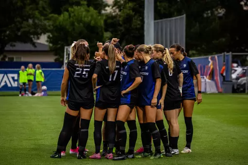 Boise State soccer team huddle.