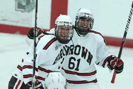 Pair of Short Handed Goals Lift #18 Colgate Past Brown, 5-3 Image