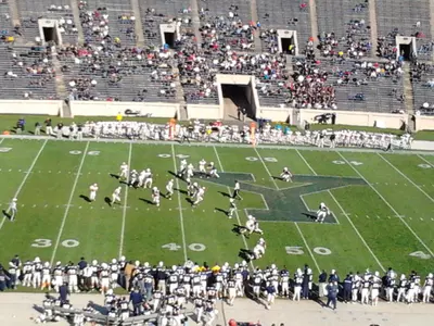 Kachmer's 192 Yards and Three TD's Lifts Brown Over Yale, 34-28 Image