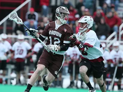 Hurster, DePeters Lead Brown Laxers Over St. Joseph's, 17-9 Image