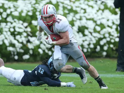 Brian Strachan's Three Touchdowns Lift Brown To 27-24 Overtime Win Over Holy Cross, For Phil Estes 100th Career Victory Image