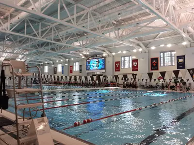 Women's Swimming and Diving Opens With 136-107 Triumph Over Northeastern Image