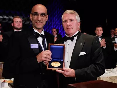 Dr. Tom Catena Presented With National Football Foundation Gold Medal Image