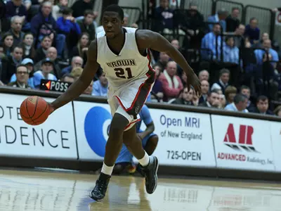 Cedric Kuakumensah's Double-Double Lifts Brown Over Penn, 62-55 Image