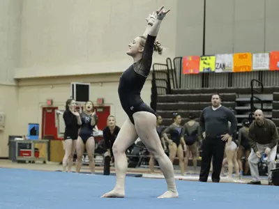 Walters Dazzles, Gymnastics Takes First at Springfield with Season-High Score Image