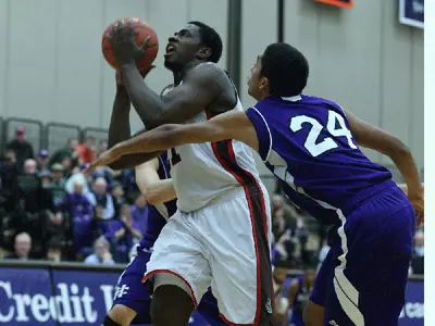 Holy Cross Holds Off Brown, 68-65, In CollegeInsider.com Postseason Tournament Image