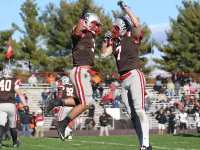 Pena's Last Minute Touchdown Run, Jette's 99-yard Kick-off Return Powers Brown Over Princeton, 38-31 Image