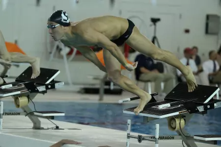 Men's Swimming & Diving Defeats UMass, 203-95 Image