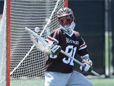 Kelly's 21 Saves, Blynn's Four Goals Lift #13 Brown Over #10 Cornell, 15-6 Image